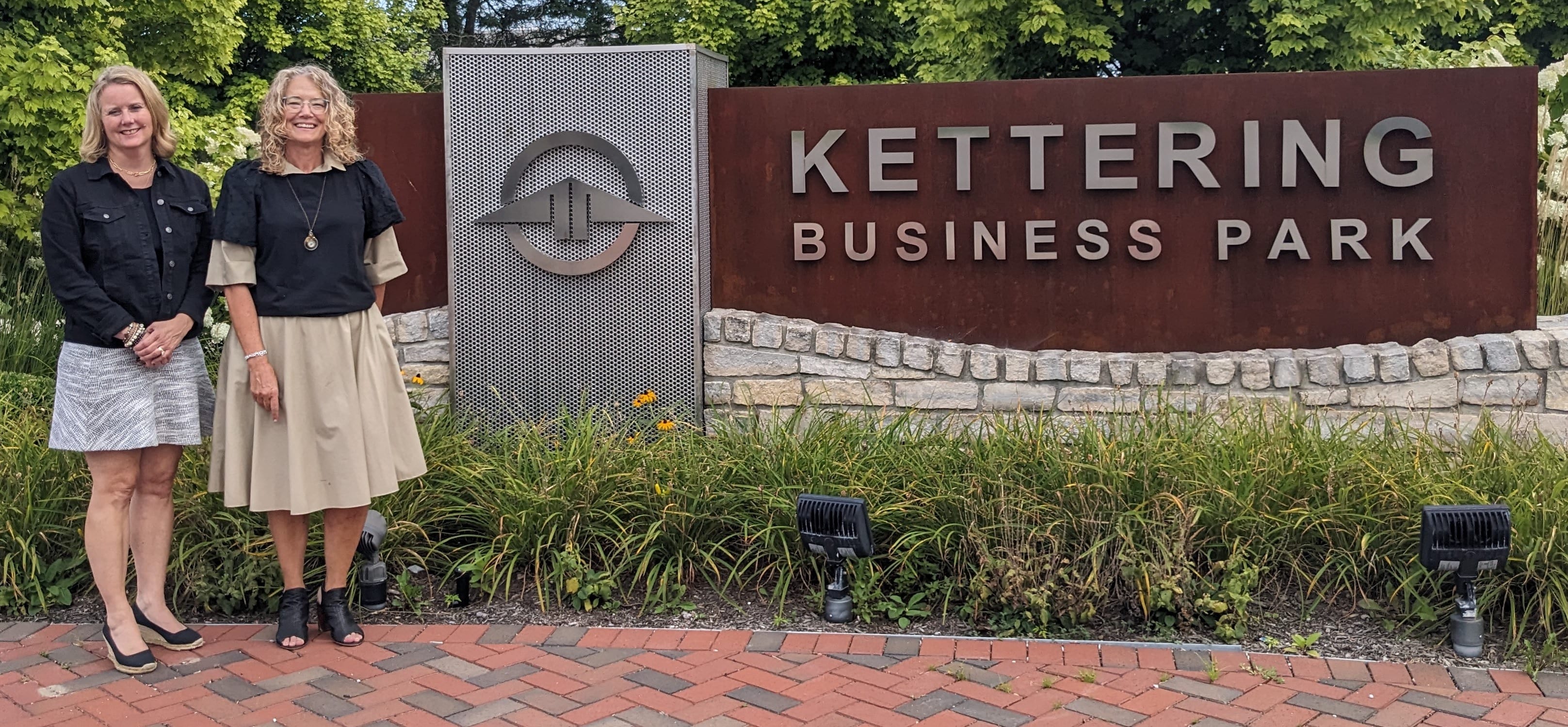 Amy Schrimpf and Laura Arber posing at Kettering Business Park